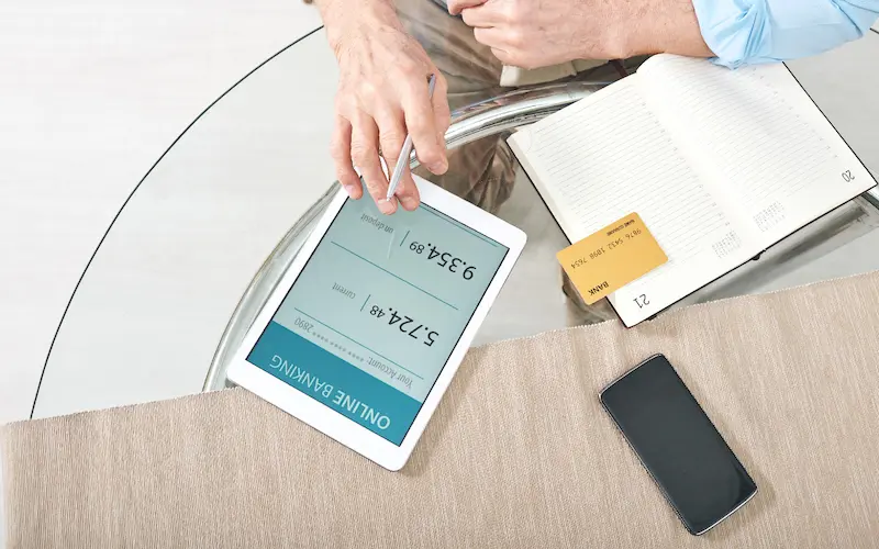 Person online banking via tablet