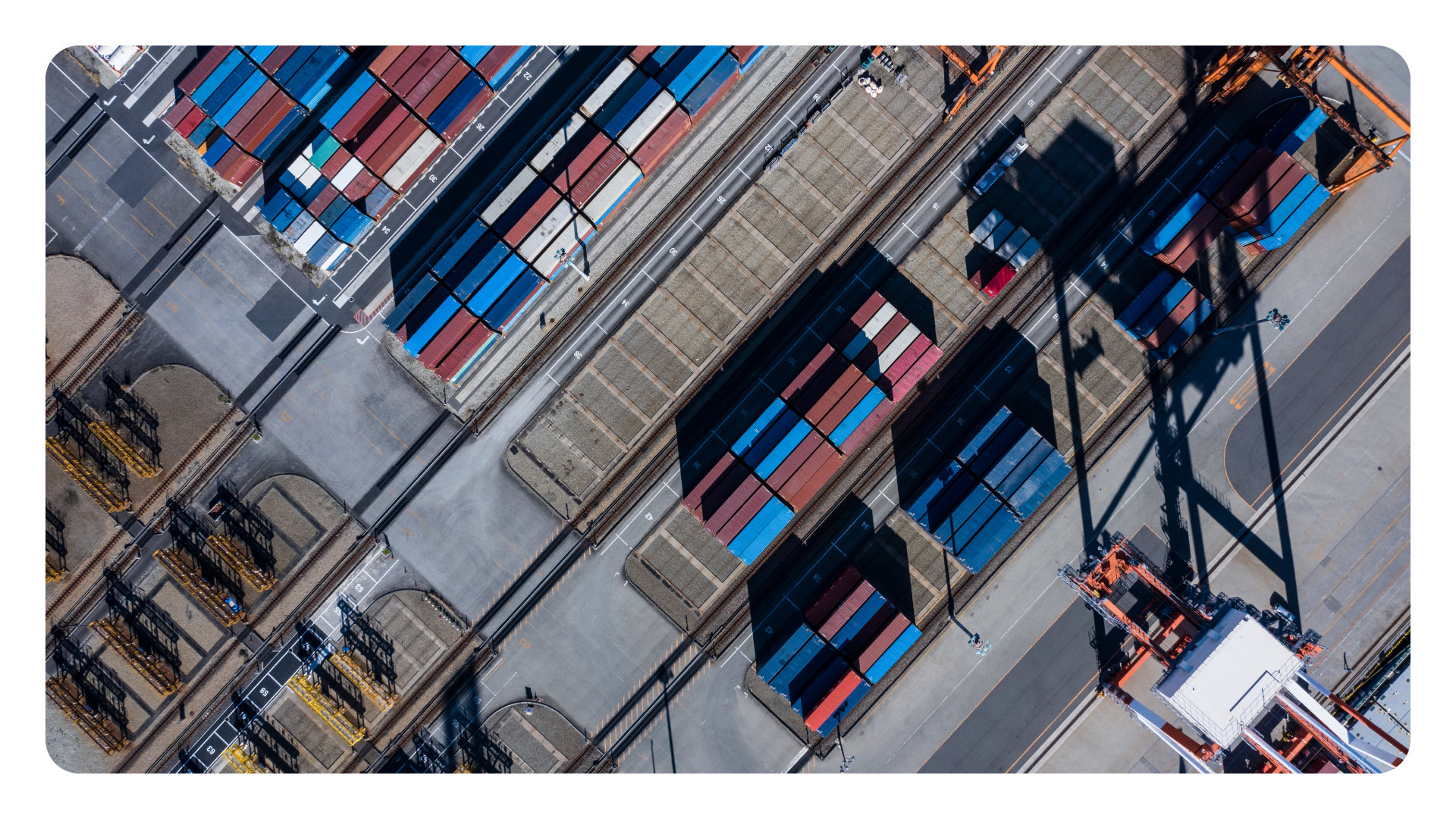 An image of freight containers in a shipping yard.