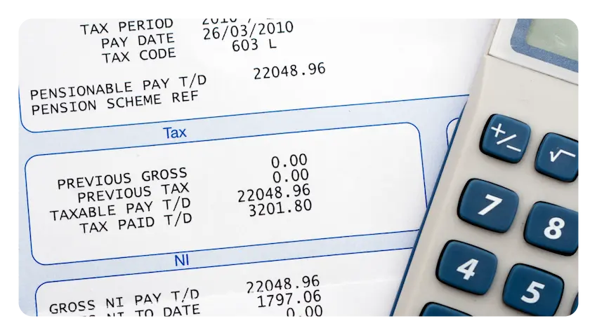 Image showing sensitive information on payslips and a calculator