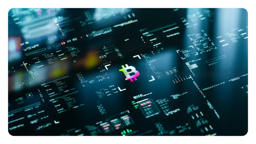An image of the bitcoin logo positioned on a computer chip.